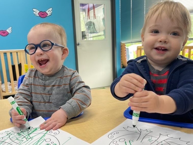 Two children smiling and playing in a classroom. At Drool of Rock, our goal is to effectively ready every child for their upcoming kindergarten journey. By integrating daily music and arts lessons into our preschool curriculum, we strive to equip children with essential tools for success, ensuring a truly memorable and engaging preschool experience. Drool of Rock is located in Cockeysville, Maryland and Owings Mills, Maryland.