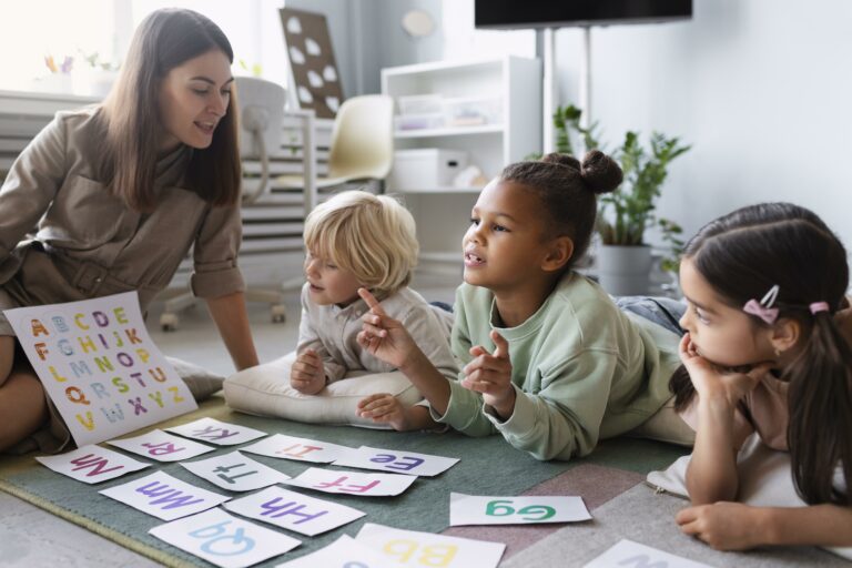 Children learning alphabet with teacher at home.